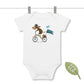 White Baby Bodysuit with a print of an illustration of a wire-haired Dachshund on a bike